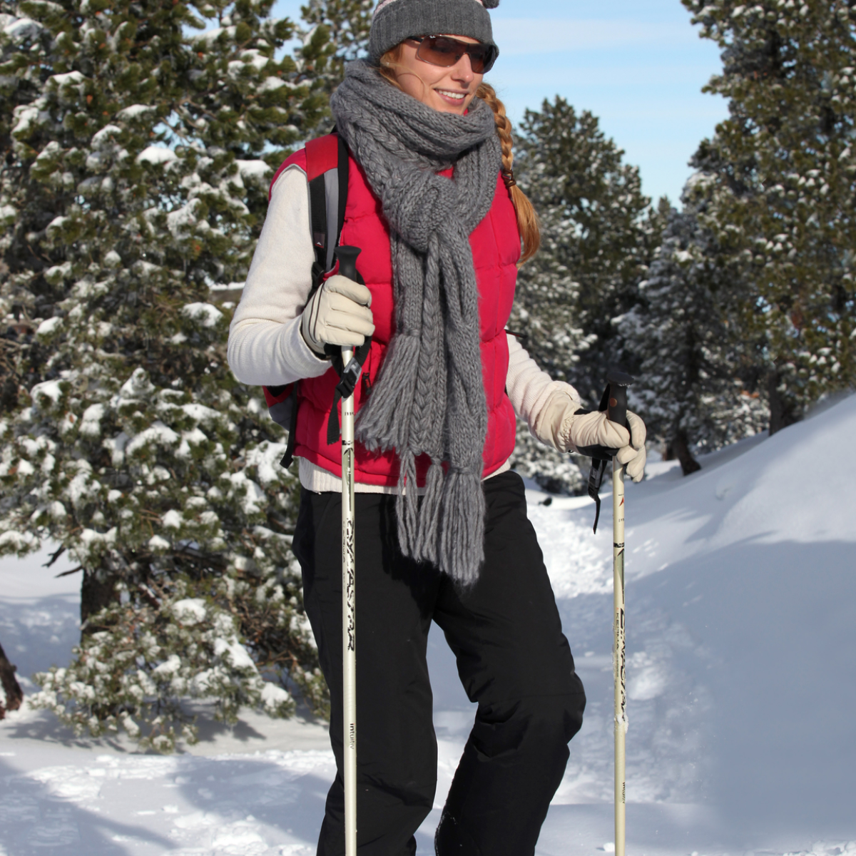 a person riding skis down a snow covered slope